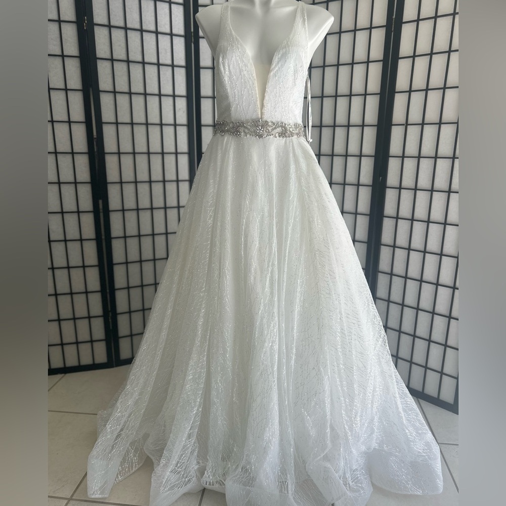 Elegant Glittery White Gown with Silver Accents